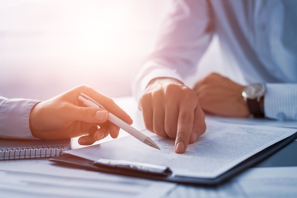 attorney going over form with client